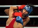 Tokyo: India's Lovlina Borgohain (blue) exchanges punches with Busenaz Surmeneli of Turkey in the women's welterweight (64-69kg) category boxing semifinal match, at the Summer Olympics 2020, in Tokyo, Wednesday, Aug 4, 2021. Borgohain lost the match.