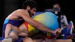 India's Kumar Ravi beat Kazakhstan's Nurislam Sanayev in the men's 57kg freestyle wrestling semifinal match at the Tokyo Olympics. (AP) India's Kumar Ravi beat Kazakhstan's Nurislam Sanayev in the men's 57kg freestyle wrestling semifinal match at the Tokyo Olympics. (AP)