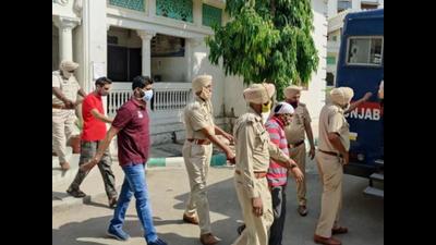 The Bargari sacrilege incident accused being escorted back to jail after a hearing in the case in Faridkot in May. (HT file photo) The Bargari sacrilege incident accused being escorted back to jail after a hearing in the case in Faridkot in May. (HT file photo)