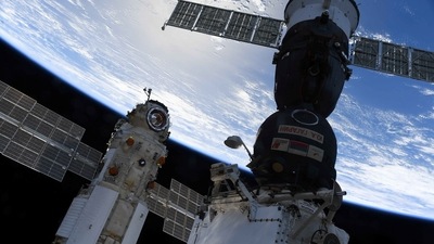 The Nauka (Science) Multipurpose Laboratory Module is seen docked to the International Space Station (ISS) next to next to Soyuz MS-18 spacecraft on July 29, 2021. (via REUTERS)