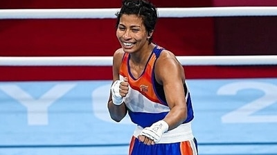 Indian boxer Lovlina Borgohain poses after her semifinal bout in the welterweight 64-69kg category at Tokyo Olympics 2020