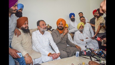 Punjab Congress president Navjot Singh Sidhu addresses a press conference at his residence in Patiala on Wednesday. (PTI)