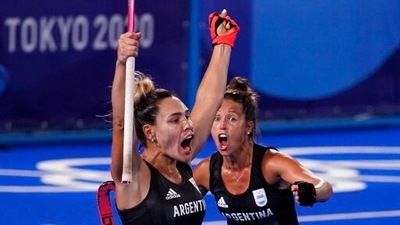 Argentina's Maria Noel Barrionuevo, left, celebrates after scoring on India goalkeeper Savita during a women's field hockey semi-final match at the 2020 Summer Olympics, Wednesday, Aug. 4, 2021, in Tokyo, Japan. (AP Photo/John Locher) (AP) Argentina's Maria Noel Barrionuevo, left, celebrates after scoring on India goalkeeper Savita during a women's field hockey semi-final match at the 2020 Summer Olympics, Wednesday, Aug. 4, 2021, in Tokyo, Japan. (AP Photo/John Locher) (AP)
