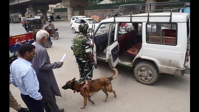 Security personnel frisk a vehicle ahead of the second anniversary of abrogation of Article 370, in Srinagar on Wednesday. (ANI)