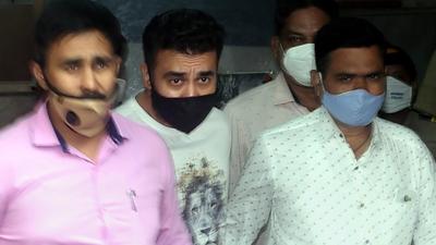 Raj Kundra (C) being taken to the Esplanade court as he was arrested in the pornography-related case Mumbai, on July 23. (File photo) Raj Kundra (C) being taken to the Esplanade court as he was arrested in the pornography-related case Mumbai, on July 23. (File photo)