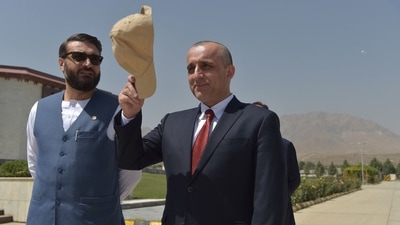 Afghanistan vice president Amrullah Saleh (right) gestures holding his cap as he stands along with National Security Adviser of Afghanistan Hamdullah Mohib as they wait for the arrival of Afghanistan's President Ashraf Ghani in Kabul. (AFP File Photo) Afghanistan vice president Amrullah Saleh (right) gestures holding his cap as he stands along with National Security Adviser of Afghanistan Hamdullah Mohib as they wait for the arrival of Afghanistan's President Ashraf Ghani in Kabul. (AFP File Photo)