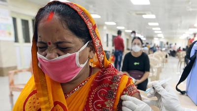 A beneficiary receives a dose of Covid-19 vaccine at Motilal Nehru Medical College, in Prayagraj on August 3. (ANI) A beneficiary receives a dose of Covid-19 vaccine at Motilal Nehru Medical College, in Prayagraj on August 3. (ANI)