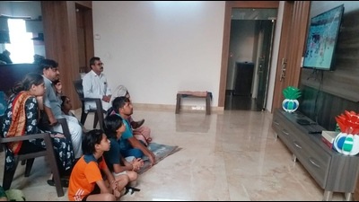 Neeraj’s family watching live telecast of his performance at his native village on Wednesday morning. (HT Photo) Neeraj’s family watching live telecast of his performance at his native village on Wednesday morning. (HT Photo)