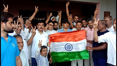 Family and fans celebrating the victory of wrestler Ravi Dahiya at his native village in Sonepat on Wednesday. (Manoj Dhaka/HT) Family and fans celebrating the victory of wrestler Ravi Dahiya at his native village in Sonepat on Wednesday. (Manoj Dhaka/HT)