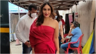 Kareena Kapoor Khan was snapped by the paparazzi on the sets of a shoot in Mumbai today. The star, who delivered her second baby earlier this year, looked glamorous in a bright red gown as she arrived for the shoot. (Varinder Chawla) Kareena Kapoor Khan was snapped by the paparazzi on the sets of a shoot in Mumbai today. The star, who delivered her second baby earlier this year, looked glamorous in a bright red gown as she arrived for the shoot. (Varinder Chawla)
