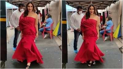 Kareena painted the town a romantic red in her one-shoulder ensemble. It featured an exaggerated bow detail that extended from the shoulder up to the waist. (Varinder Chawla) Kareena painted the town a romantic red in her one-shoulder ensemble. It featured an exaggerated bow detail that extended from the shoulder up to the waist. (Varinder Chawla)