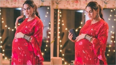 Neha looked to-die-for in this red ensemble by Arpita Mehta. She wore this outfit for her Diwali celebration. (Instagram/@nehadhupia) Neha looked to-die-for in this red ensemble by Arpita Mehta. She wore this outfit for her Diwali celebration. (Instagram/@nehadhupia)