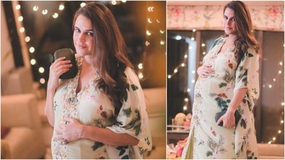 Neha loved keeping her look simple yet very stylish during her first pregnancy. In this picture, she can be seen wearing a floral printed embroidered Kaftan which she accessorised with a black purse and a stone ring. (Instagram/@nehadhupia) Neha loved keeping her look simple yet very stylish during her first pregnancy. In this picture, she can be seen wearing a floral printed embroidered Kaftan which she accessorised with a black purse and a stone ring. (Instagram/@nehadhupia)