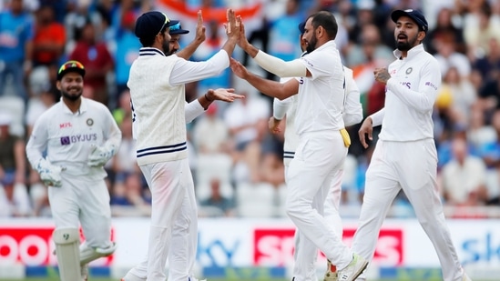 India's Mohammed Shami celebrates taking the wicket of England's Dan Lawrence with teammates(Action Images via Reuters)