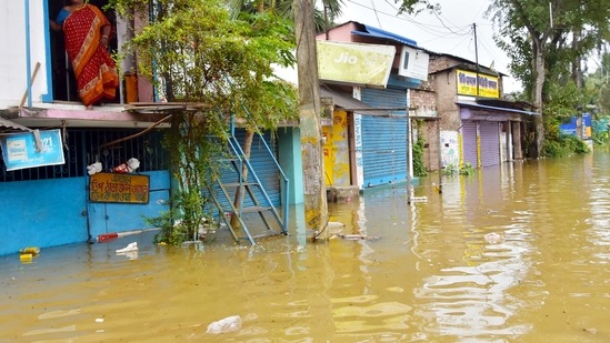 Panchayat Minister Subrata Mukherjee visited the flood-hit areas of Ghatal in Paschim Medinipur district on July 3.(ANI)
