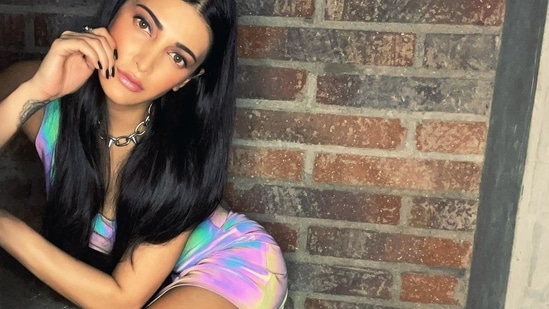 Shruti was wearing a holographic print crop top with a matching mini skirt as she posed for the camera. (Instagram)