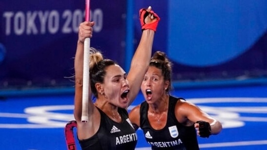 Argentina's Maria Noel Barrionuevo, left, celebrates after scoring on India goalkeeper Savita during a women's field hockey semi-final match at the 2020 Summer Olympics, Wednesday, Aug. 4, 2021, in Tokyo, Japan. (AP Photo/John Locher)(AP)