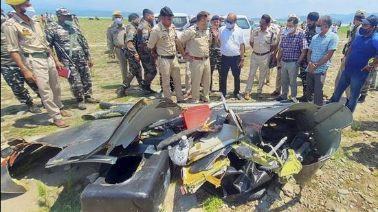 On Tuesday, the rescue crew recovered the wreckage of the chopper along with some pilot gear. (PTI) On Tuesday, the rescue crew recovered the wreckage of the chopper along with some pilot gear. (PTI)