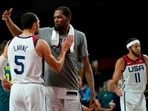 United States's Kevin Durant (7), center, celebrates with teammate Zachary Lavine (5) after their win in the men's basketball semifinal game against Australia at the 2020 Summer Olympics.(AP) United States's Kevin Durant (7), center, celebrates with teammate Zachary Lavine (5) after their win in the men's basketball semifinal game against Australia at the 2020 Summer Olympics.(AP)