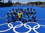 Players of India pose for a group photo after winning the match for bronze. REUTERS/Bernadett Szabo