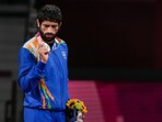 India's Ravi Dahiya holds his silver medal during the medal ceremony of the men's freestyle 57kg wrestling event at 2020 Tokyo Olympics(PTI)