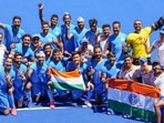 Indian players pose for photographs as they celebrate their victory over Germany in the men's field hockey bronze medal match, at the 2020 Tokyo Olympics(PTI) Indian players pose for photographs as they celebrate their victory over Germany in the men's field hockey bronze medal match, at the 2020 Tokyo Olympics(PTI)