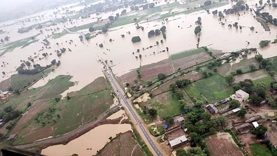 According to a home department official, more than 1,100 people were rescued from flood-affected villages on Thursday. (ANI)