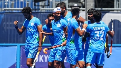 Tokyo 2020 Olympics - Hockey - Men - Bronze medal match - Germany v India - Oi Hockey Stadium, Tokyo, Japan - August 5, 2021. Harmanpreet Singh of India celebrates with teammates after scoring. (REUTERS)