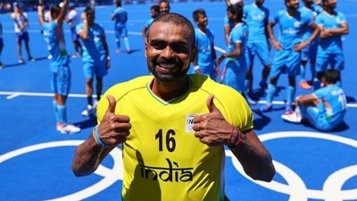 Tokyo 2020 Olympics - Hockey - Men - Bronze medal match - Germany v India - Oi Hockey Stadium, Tokyo, Japan - August 5, 2021. Sreejesh Parattu Raveendran of India poses for pictures as he celebrates winning the match for bronze. REUTERS/Bernadett Szabo (REUTERS)