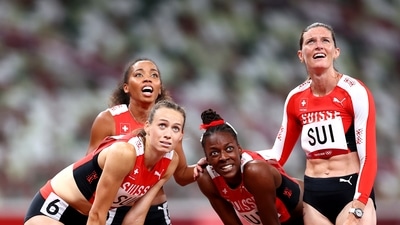 Tokyo 2020 Olympics - Athletics - Women's 4 x 400m Relay - Round 1 - Olympic Stadium, Tokyo, Japan - August 5, 2021. Lea Sprunger of Switzerland, Silke Lemmens of Switzerland, Rachel Pellaud of Switzerland and Yasmin Giger of Switzerland react REUTERS/Andrew Boyers (REUTERS)