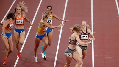 Tokyo 2020 Olympics - Athletics - Women's 4 x 400m Relay - Round 1 - Olympic Stadium, Tokyo, Japan - August 5, 2021. Athletes compete REUTERS/Phil Noble (REUTERS)
