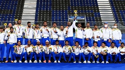 Indian Men's Hockey players pose for a photo with their bronze medal Indian Men's Hockey players pose for a photo with their bronze medal