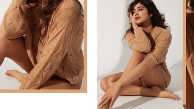 Winter is coming or so Janhvi Kapoor proved as she raised the hotness quotient by ditching pants to strike steamy poses only in the knit sweater. (Instagram/vandafashionagency) Winter is coming or so Janhvi Kapoor proved as she raised the hotness quotient by ditching pants to strike steamy poses only in the knit sweater. (Instagram/vandafashionagency)