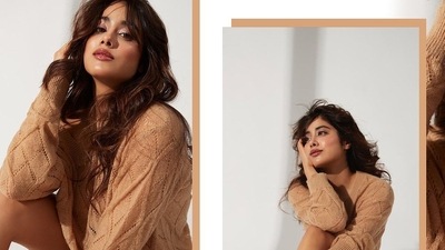 Completing her attire with a pair of barely visible beige hot pants, Janhvi Kapoor left her luscious soft curls open down her shoulders to nail the cosy vibe and amplified the glam quotient with a dab of maroon lipgloss, rosy blushed and highlighted cheeks, mascara-laden eyelashes and filled-in eyebrows. (Instagram/vandafashionagency) Completing her attire with a pair of barely visible beige hot pants, Janhvi Kapoor left her luscious soft curls open down her shoulders to nail the cosy vibe and amplified the glam quotient with a dab of maroon lipgloss, rosy blushed and highlighted cheeks, mascara-laden eyelashes and filled-in eyebrows. (Instagram/vandafashionagency)