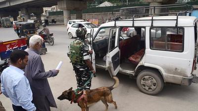 Security personnel frisk a vehicle ahead of the second anniversary of nullification of Article 370, in Srinagar on Wednesday, August 4. (ANI)
