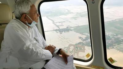 Kumar was talking to media persons after conducting an aerial survey of flood-affected areas in the state on Thursday (Santosh Kumar/HT photo) Kumar was talking to media persons after conducting an aerial survey of flood-affected areas in the state on Thursday (Santosh Kumar/HT photo)
