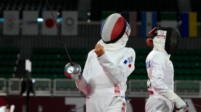 Marie Oteiza of France celebrates winning a point against Gulnaz Gubaydullina of the Russian Olympic Committee in the fencing portion of the women's modern pentathlon at the 2020 Summer Olympics, Thursday, Aug. 5, 2021, in Tokyo, Japan. (AP Photo/Hassan Ammar) (AP) Marie Oteiza of France celebrates winning a point against Gulnaz Gubaydullina of the Russian Olympic Committee in the fencing portion of the women's modern pentathlon at the 2020 Summer Olympics, Thursday, Aug. 5, 2021, in Tokyo, Japan. (AP Photo/Hassan Ammar) (AP)