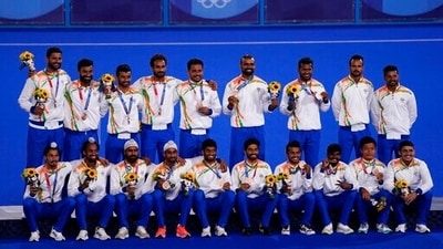 The India field hockey team poses for a photo with their bronze medal after taking third place in the men's field hockey event at the 2020 Summer Olympics, Thursday, Aug. 5, 2021, in Tokyo, Japan. (AP Photo/John Locher) (AP) The India field hockey team poses for a photo with their bronze medal after taking third place in the men's field hockey event at the 2020 Summer Olympics, Thursday, Aug. 5, 2021, in Tokyo, Japan. (AP Photo/John Locher) (AP)