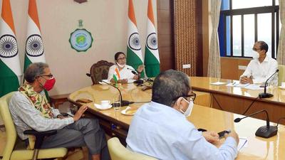 West Bengal CM Mamata Banerjee with Nobel Laureate Abhijit Vinayak Banerjee during a meeting in Kolkata on Thursday. (ANI PHOTO.) West Bengal CM Mamata Banerjee with Nobel Laureate Abhijit Vinayak Banerjee during a meeting in Kolkata on Thursday. (ANI PHOTO.)