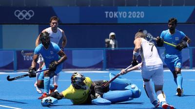 PR Sreejesh (in yellow) in action against John-John Dominique M Dohmen of Belgium during the men's semi final match at the Tokyo 2020 Olympic Games on August 3. (Getty Images) PR Sreejesh (in yellow) in action against John-John Dominique M Dohmen of Belgium during the men's semi final match at the Tokyo 2020 Olympic Games on August 3. (Getty Images)