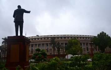 Parliament building ahead of Day 13 of the monsoon session. (AFP) Parliament building ahead of Day 13 of the monsoon session. (AFP)