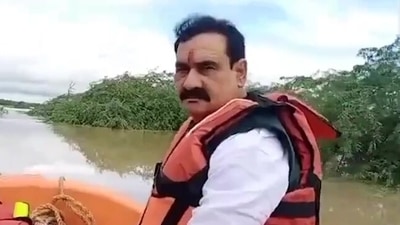 Madhya Pradesh home minister Narottam Mishra on visit to the flood-hit villages in Datia district. (ANI) Madhya Pradesh home minister Narottam Mishra on visit to the flood-hit villages in Datia district. (ANI)