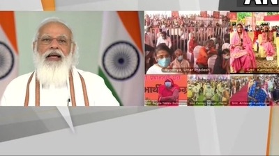 PM Narendra Modi interacts with beneficiaries of the Pradhan Mantri Garib Kalyan Anna Yojana. (ANI) PM Narendra Modi interacts with beneficiaries of the Pradhan Mantri Garib Kalyan Anna Yojana. (ANI)