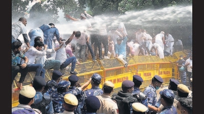 Delhi Police use water cannons to disperse Congress workers, during a protest march to Parliament on the Pegasus snooping row, farm laws and Covid management, in New Delhi on Thursday. (Raj K Raj /HT photo) Delhi Police use water cannons to disperse Congress workers, during a protest march to Parliament on the Pegasus snooping row, farm laws and Covid management, in New Delhi on Thursday. (Raj K Raj /HT photo)