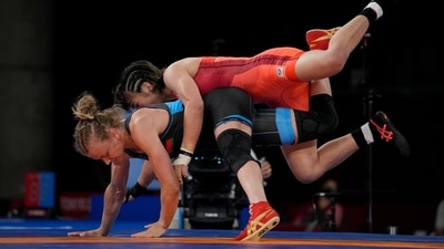 Japan?s Risako Kawai and Belarus's Iryna Kurachkina compete during the women's 57kg Freestyle wrestling final match at the 2020 Summer Olympics, Thursday, Aug. 5, 2021, in Tokyo, Japan. (AP Photo/Aaron Favila) (AP) Japan?s Risako Kawai and Belarus's Iryna Kurachkina compete during the women's 57kg Freestyle wrestling final match at the 2020 Summer Olympics, Thursday, Aug. 5, 2021, in Tokyo, Japan. (AP Photo/Aaron Favila) (AP)