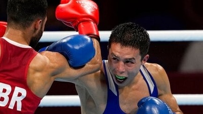 Saken Bibossinov, of Kazakhstan, right, looks for an opening against Galal Yafai, of Great Britain, during their fly weight 48-52kg semifinal boxing match at the 2020 Summer Olympics, Thursday, Aug. 5, 2021, in Tokyo, Japan. (AP Photo/Themba Hadebe) (AP) Saken Bibossinov, of Kazakhstan, right, looks for an opening against Galal Yafai, of Great Britain, during their fly weight 48-52kg semifinal boxing match at the 2020 Summer Olympics, Thursday, Aug. 5, 2021, in Tokyo, Japan. (AP Photo/Themba Hadebe) (AP)