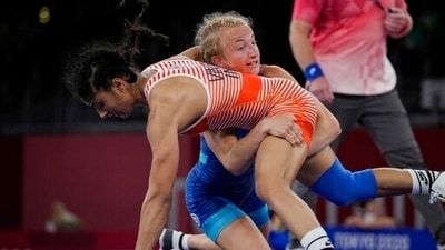 Sweden's Sofia Magdelana Mattsson competes with India's Vinesh Phogat during the women's 53kg Freestyle wrestling eights final match at the 2020 Summer Olympics. (AP) Sweden's Sofia Magdelana Mattsson competes with India's Vinesh Phogat during the women's 53kg Freestyle wrestling eights final match at the 2020 Summer Olympics. (AP)