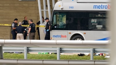 Police are looking at a scene and items are seen on the ground near a Metrobus outside the Pentagon Metro area, Tuesday, August 3, 2021, at the Pentagon in Washington. (File Photo / AP)