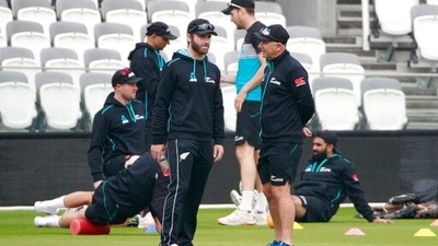 New Zealand captain Kane Williamson, left, talks with coach Gary Stead during a practice session at Lord's Cricket Ground in London. (AP) New Zealand captain Kane Williamson, left, talks with coach Gary Stead during a practice session at Lord's Cricket Ground in London. (AP)
