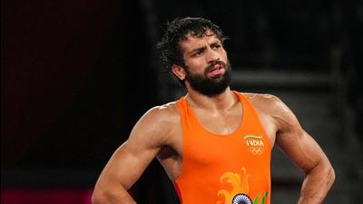 Ravi Dahiya reacts after losing against Zavur Uguev of Russian Olympic Committee in men’s freestyle 57kg final wrestling match at Tokyo on Thursday. (PTI)